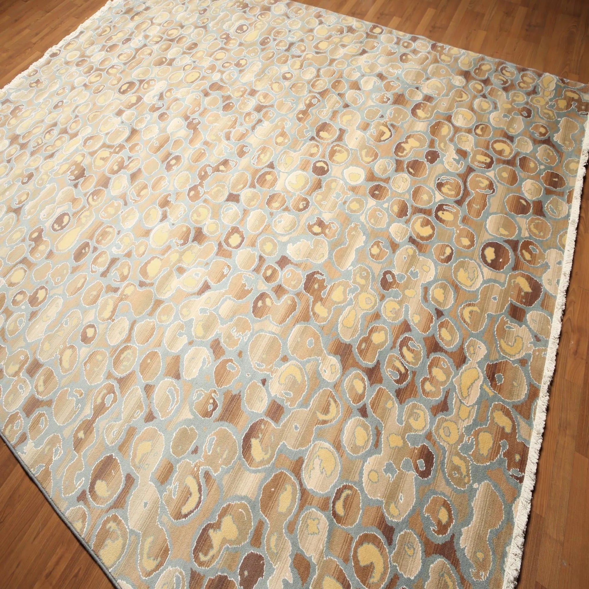Patterned rug on a wooden floor