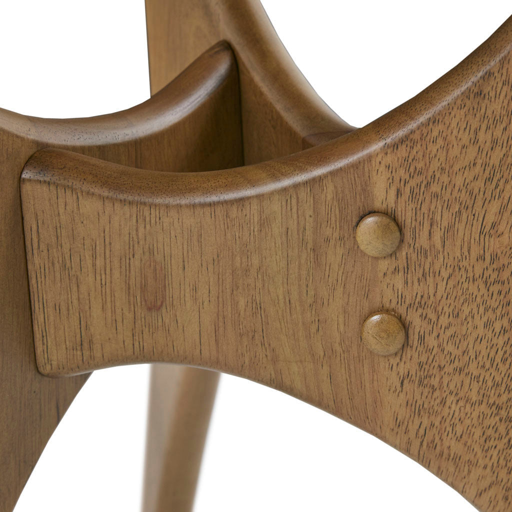 Close-up of a wooden chair with a white background
