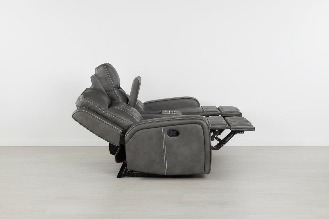 Gray recliner chair with cup holders on a white background