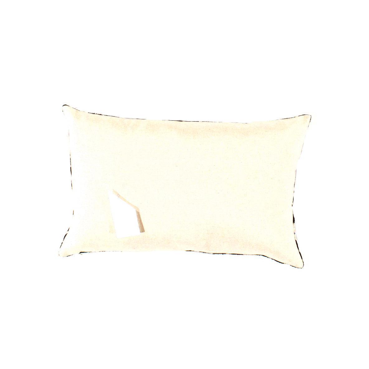 Beige pillow on a white background