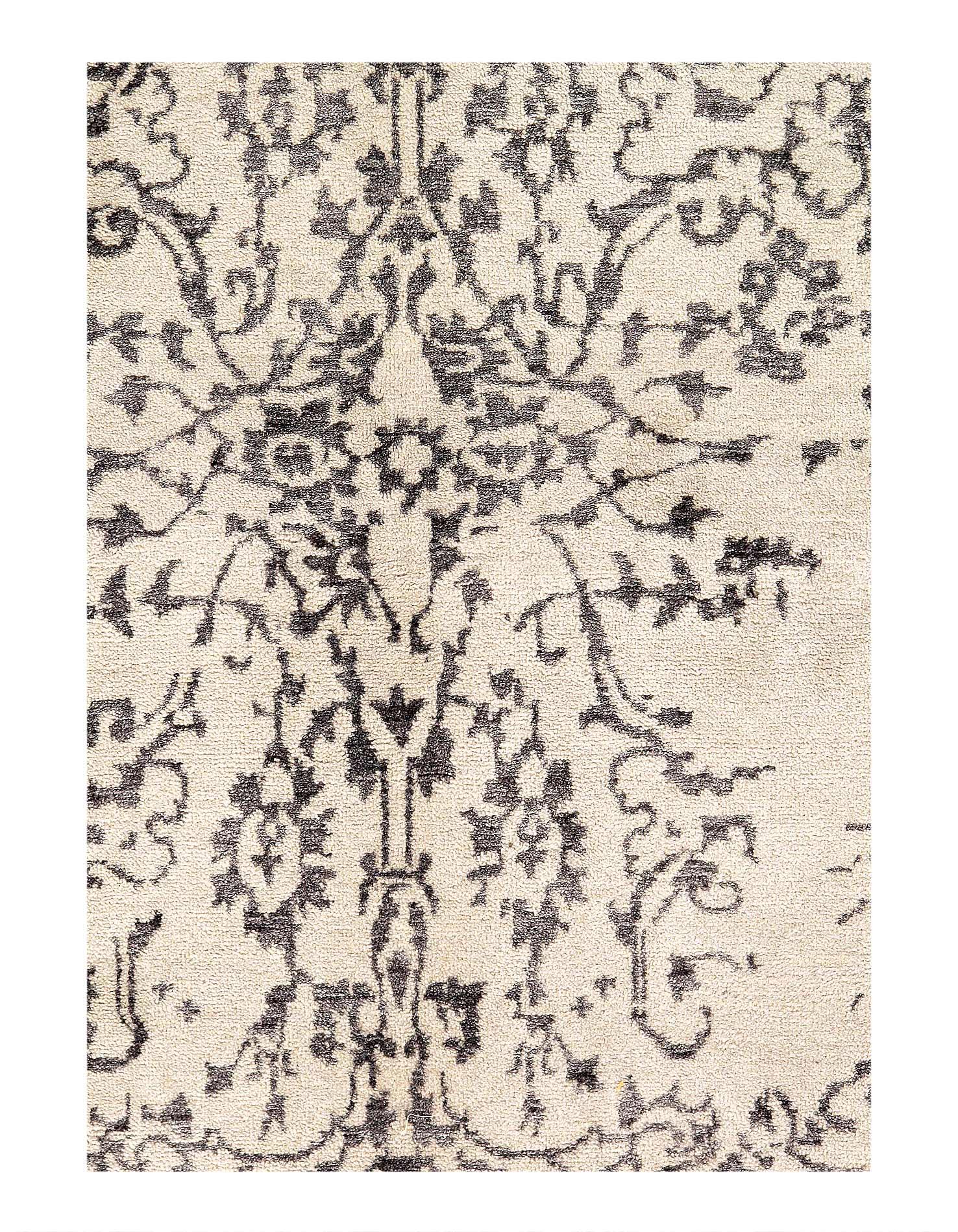 Decorative rug with intricate black pattern on beige background