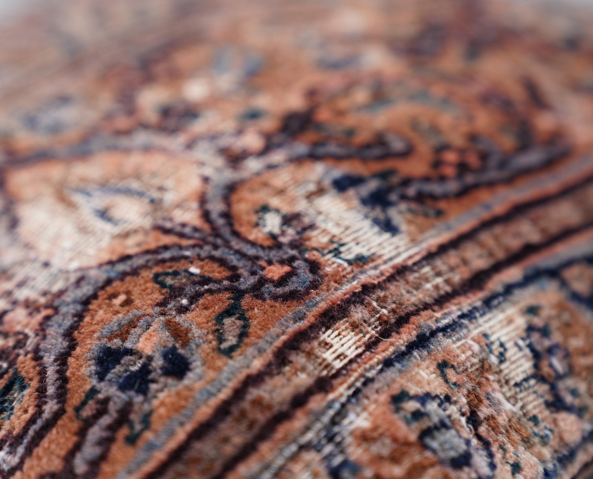 Close-up of a patterned fabric with intricate designs.