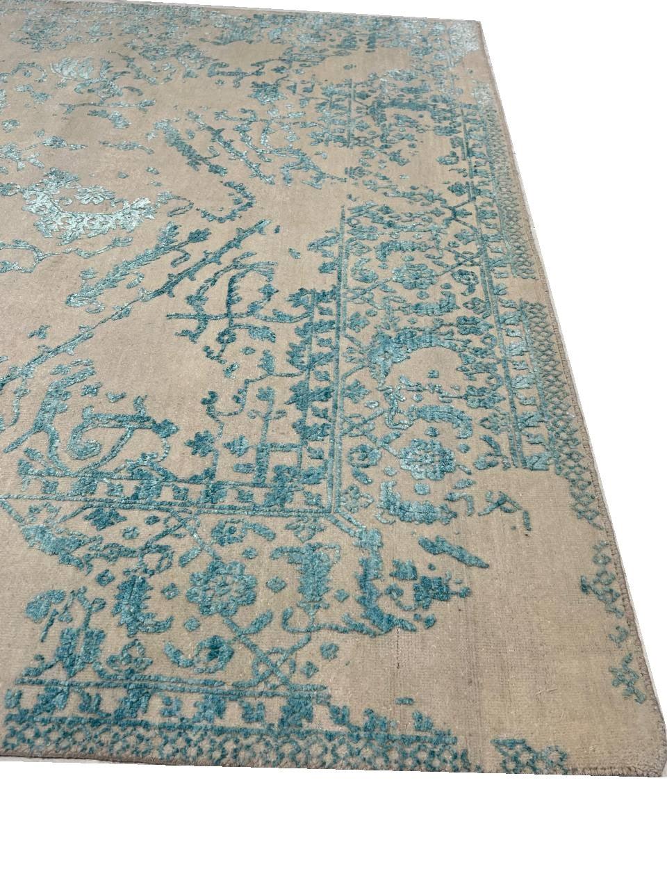 Rug with blue and beige pattern on a white background