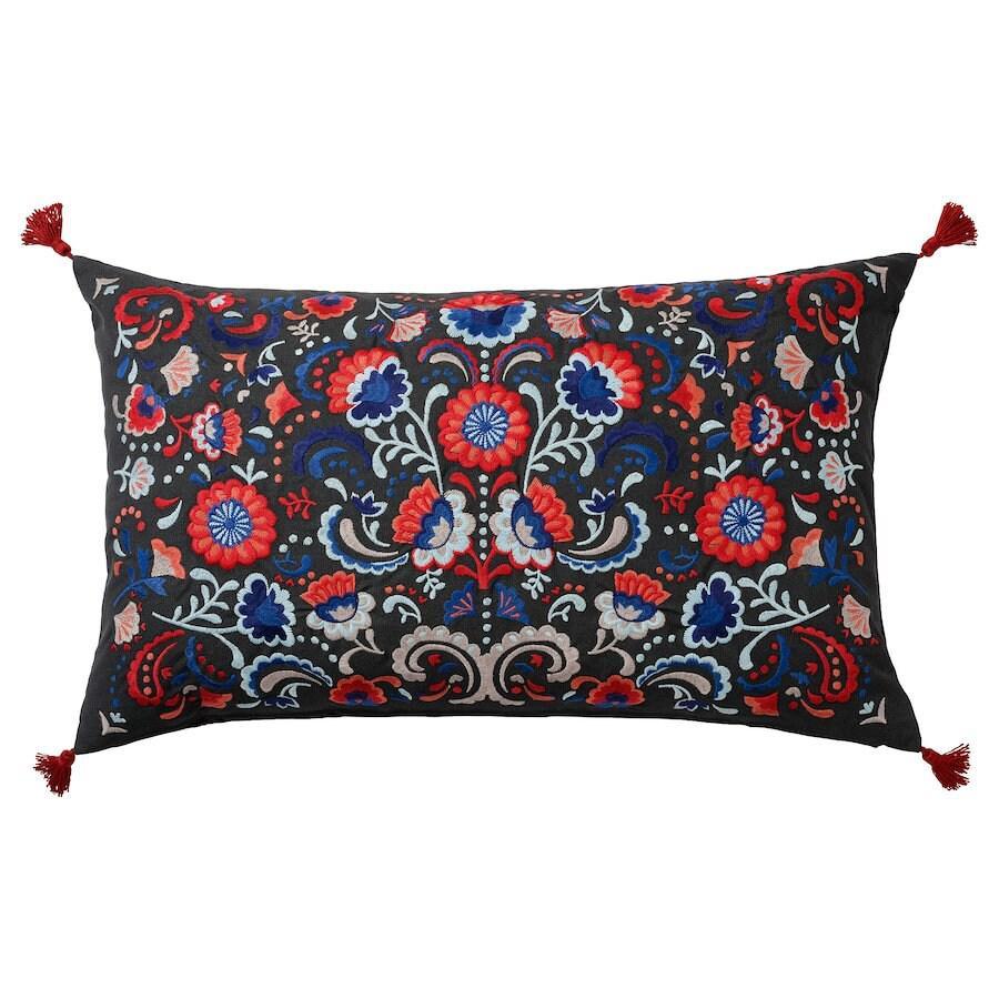 Decorative pillow with floral pattern on a white background