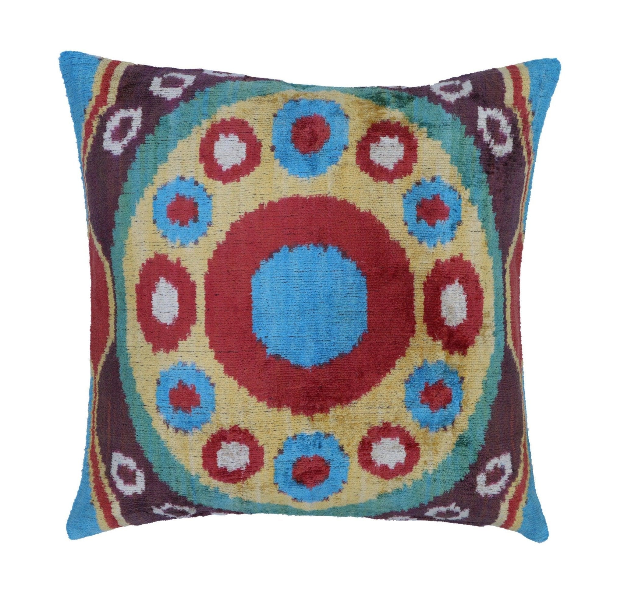 Decorative pillow with a colorful circular pattern on a white background
