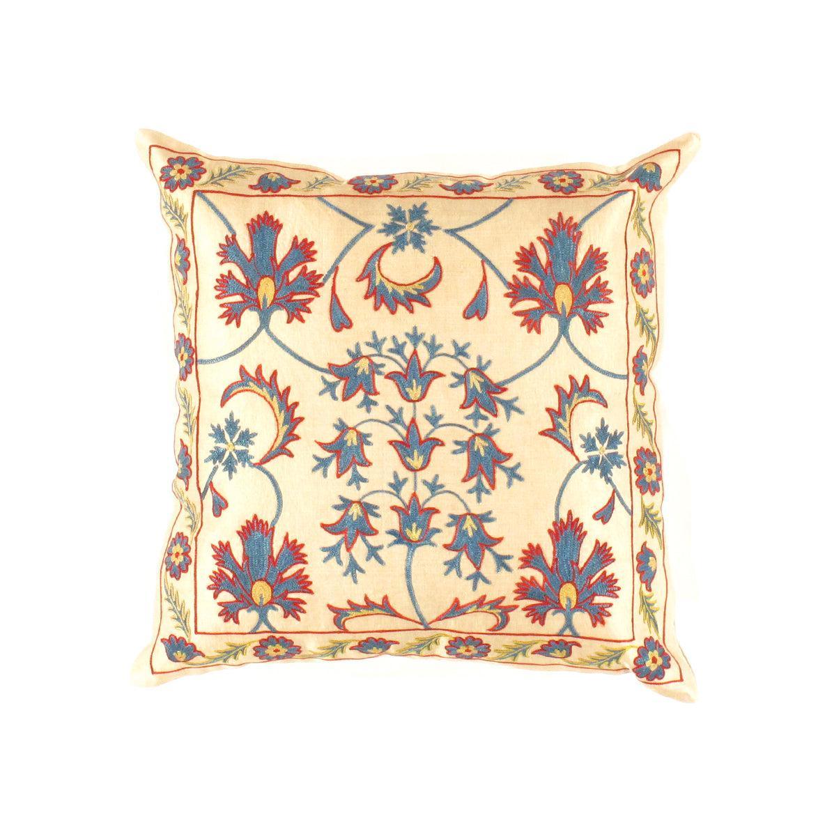 Decorative pillow with floral pattern on a beige background
