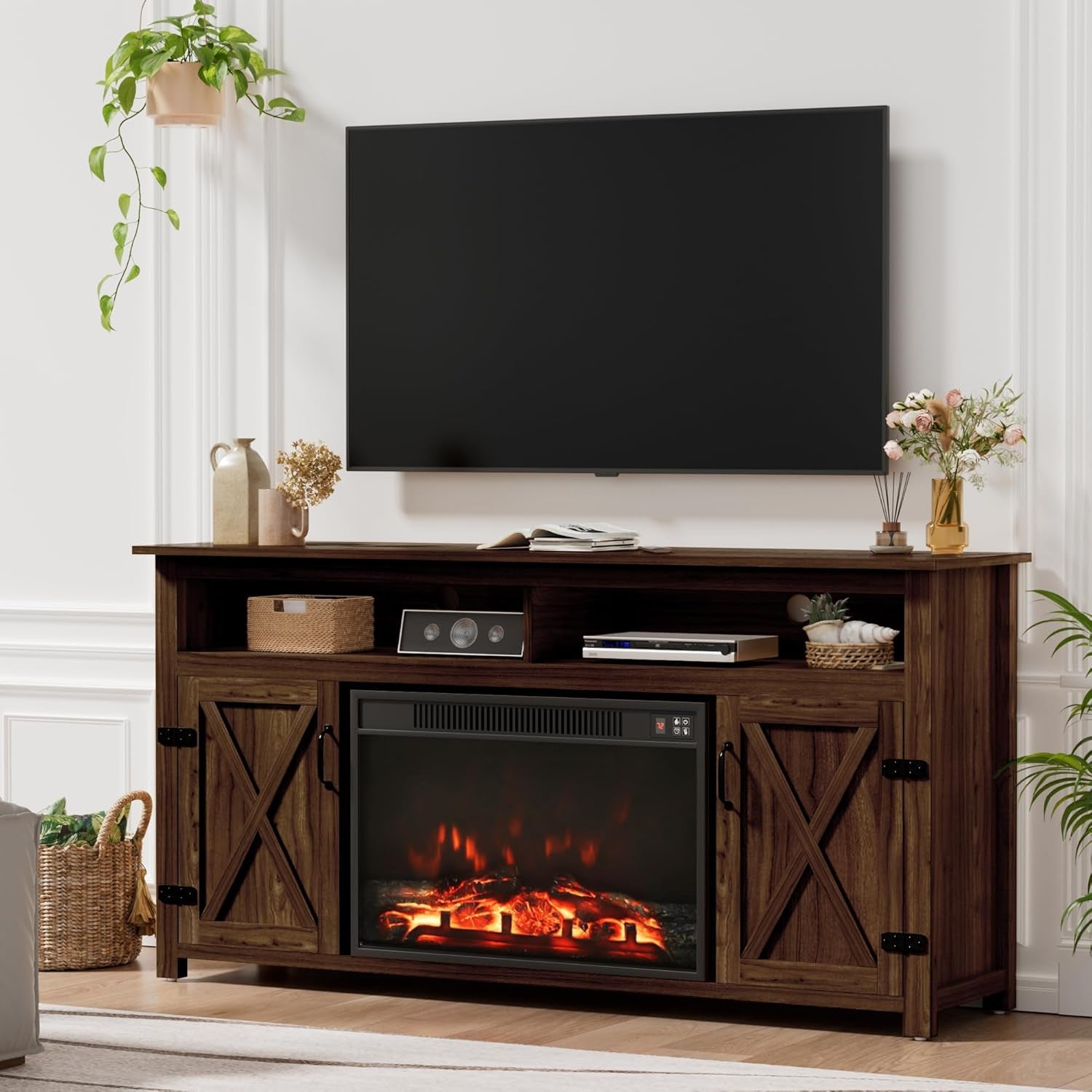 Wooden TV stand with built-in electric fireplace in a living room setting.