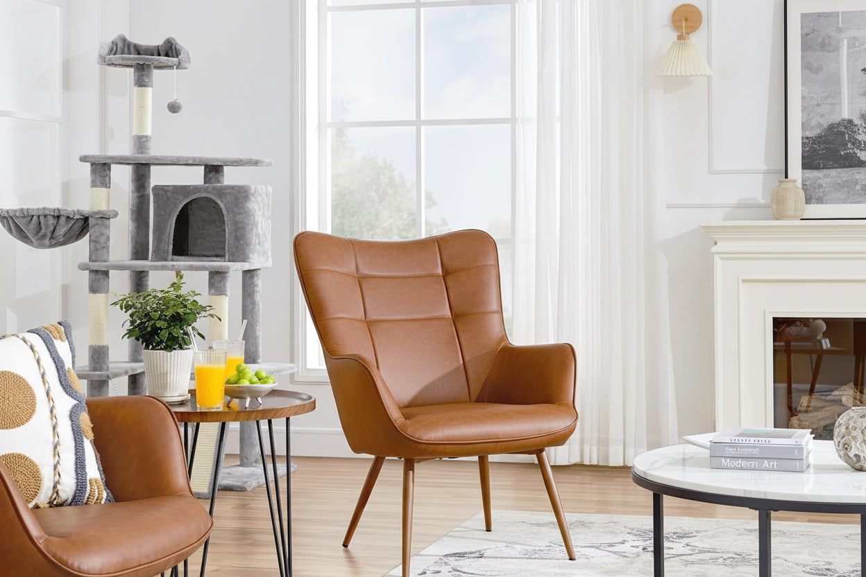 Woman sitting in a living room with a cat on her lap, surrounded by furniture and decor.