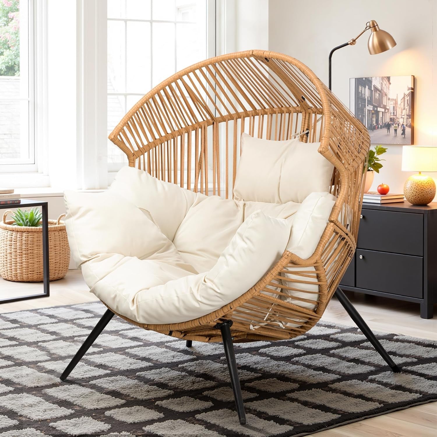 Wicker chair with white cushions in a modern living room setting