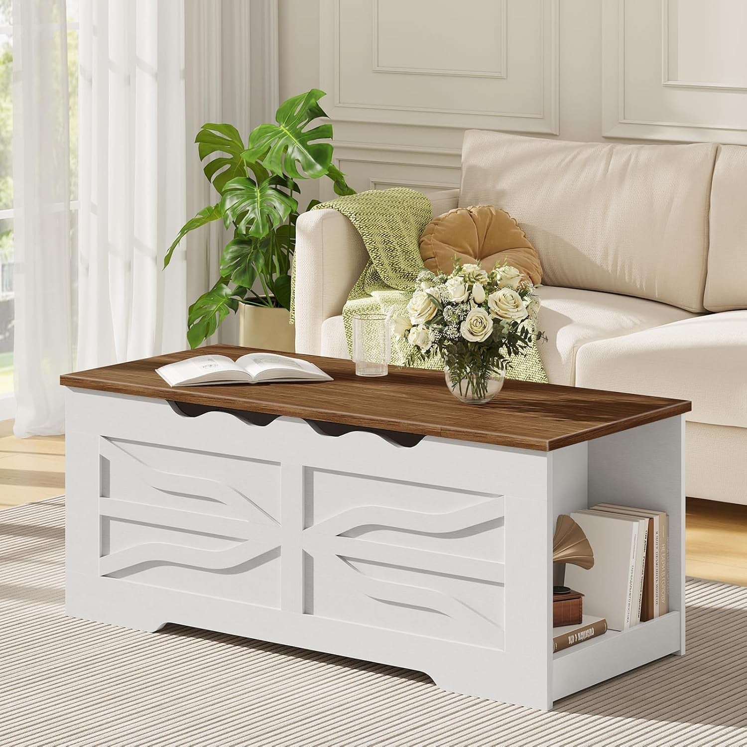White coffee table with wooden top in a living room setting