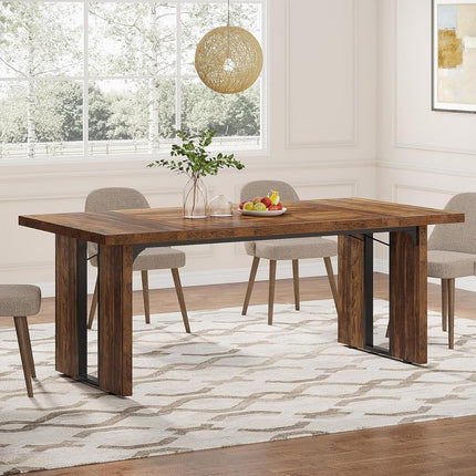 Dining room with a wooden table and chairs in a well-lit room.