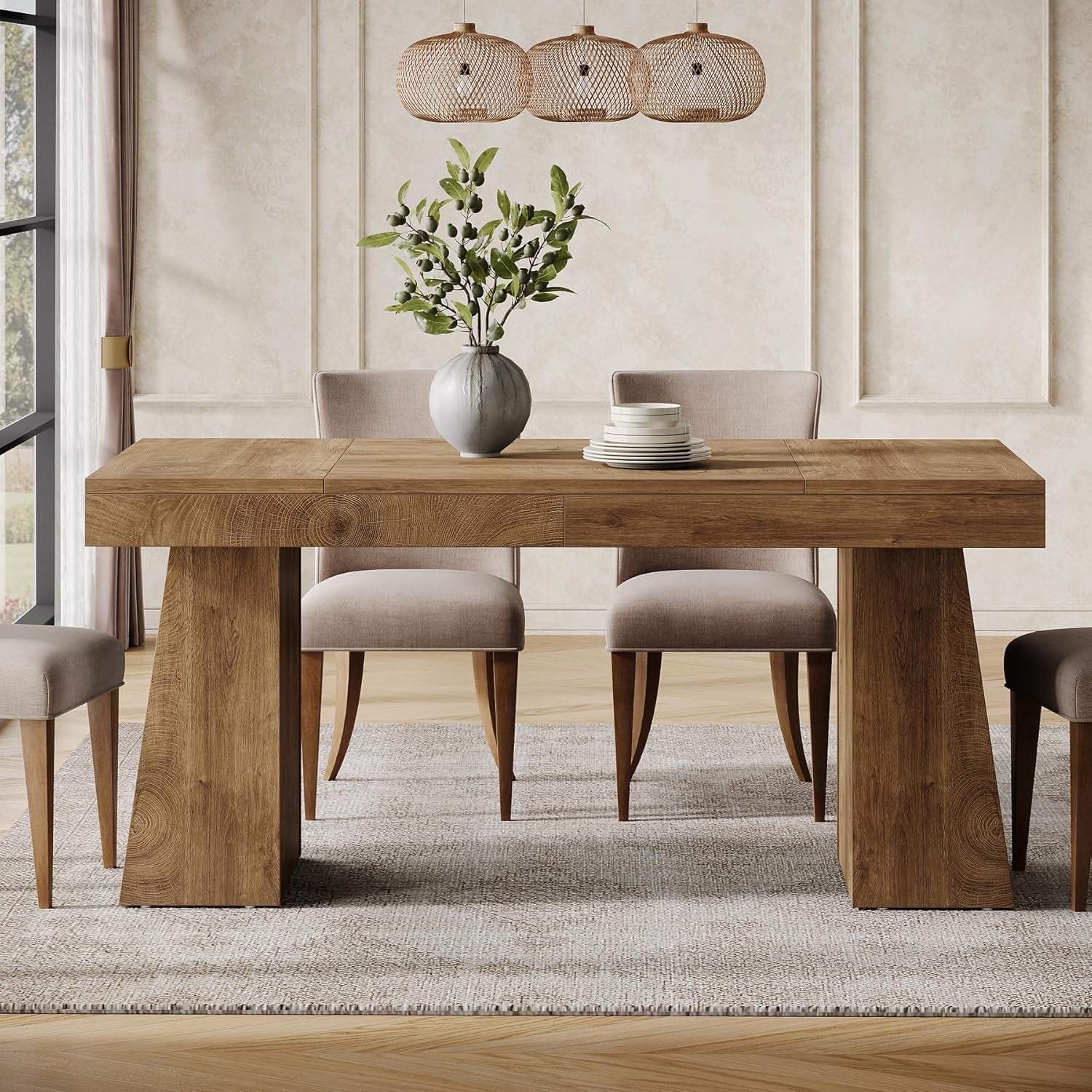 Dining room with a wooden table and chairs in a well-lit room.