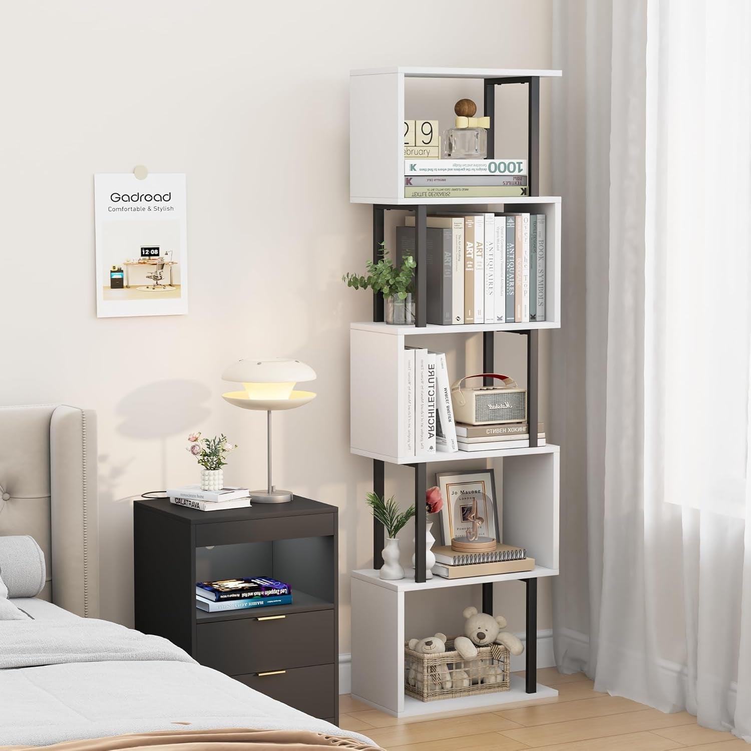 White bookshelf with books and decor items in a bedroom setting