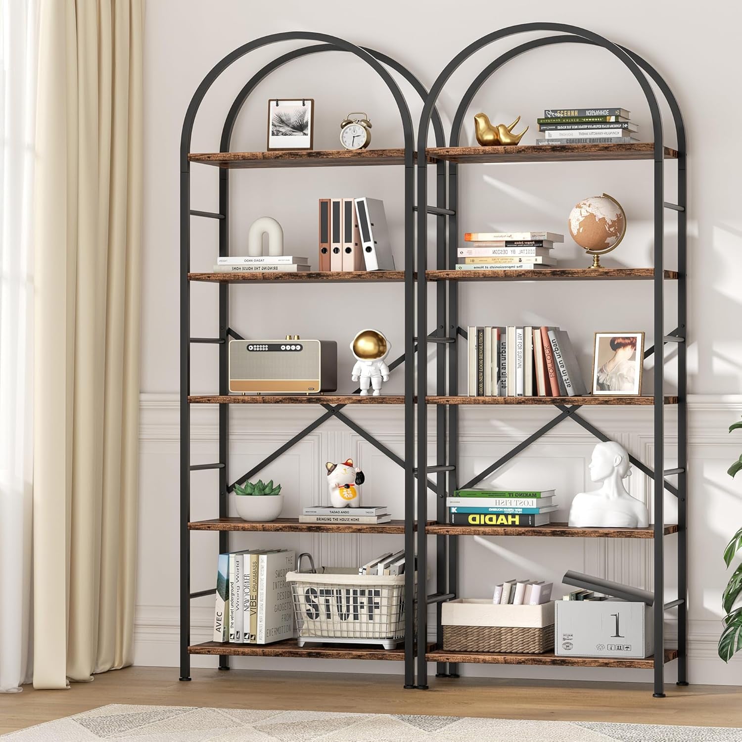 Decorative bookshelf with various items against a neutral wall