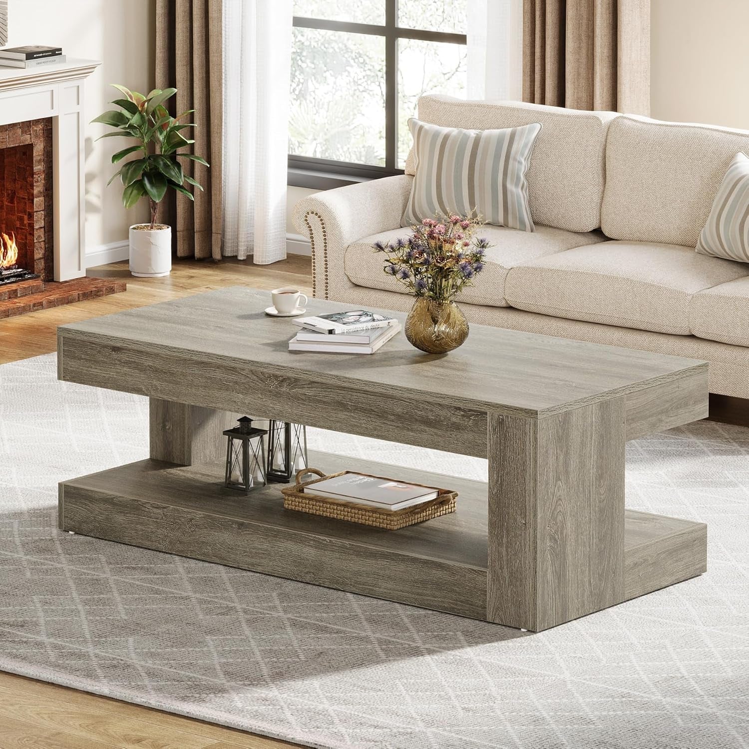 Living room with a wooden coffee table, sofa, and decorative items.