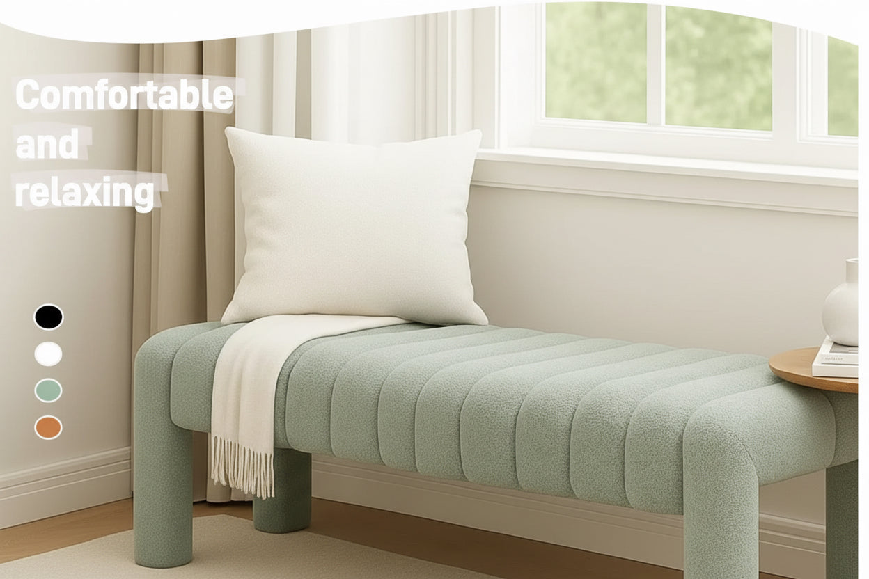 Green upholstered bench in front of a bed with white bedding in a bedroom setting.