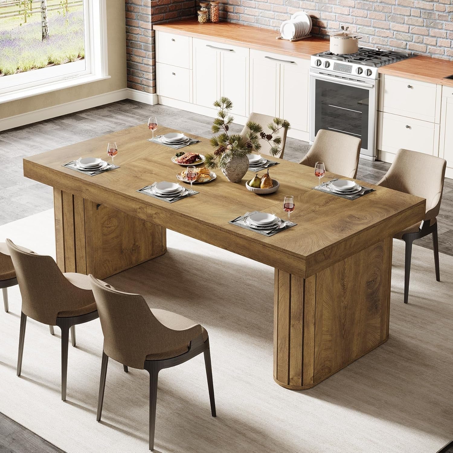 Dining table set with plates, glasses, and a vase in a modern kitchen.