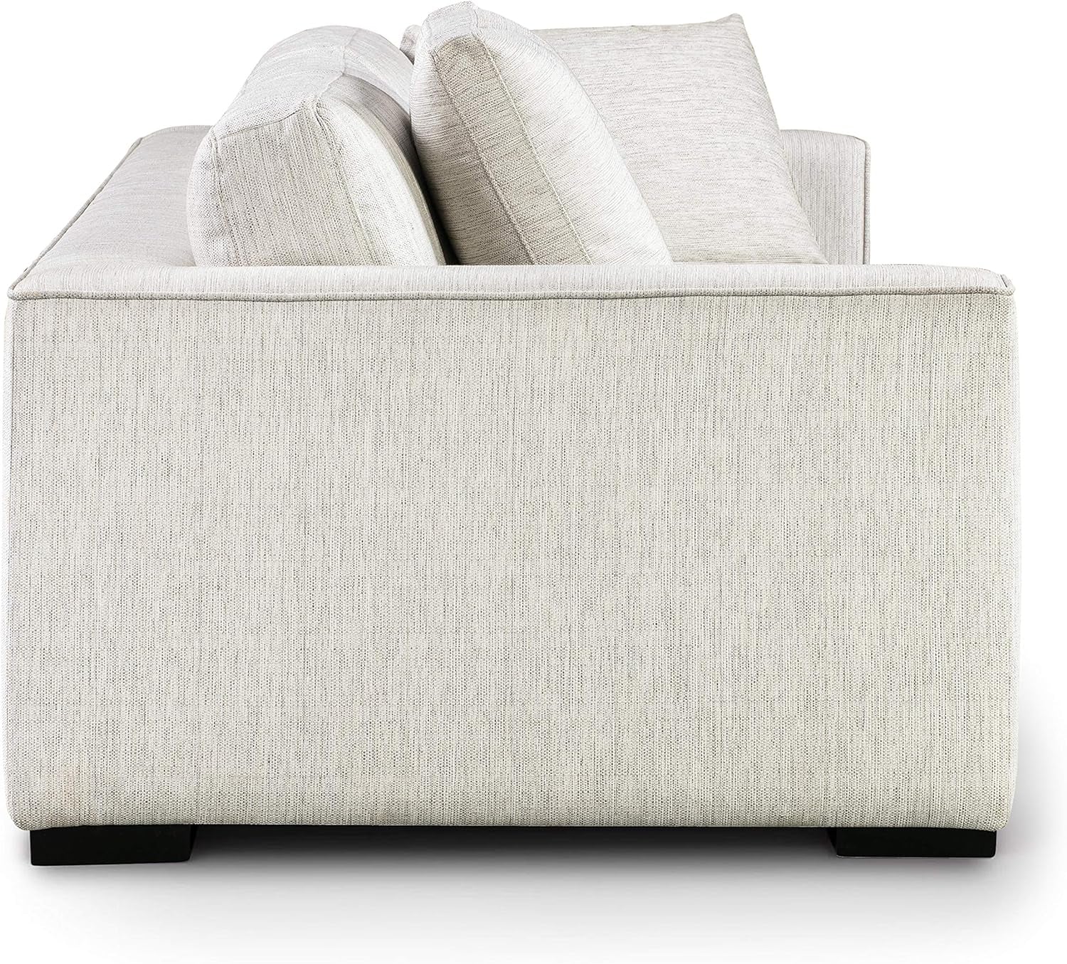 Light gray sofa with cushions on a white background