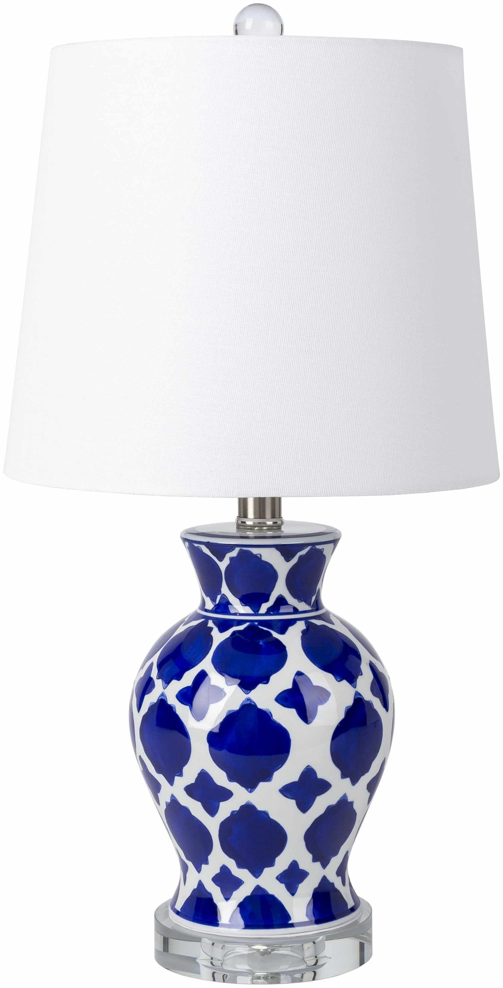 Table lamp with blue and white patterned base and white shade on a white background