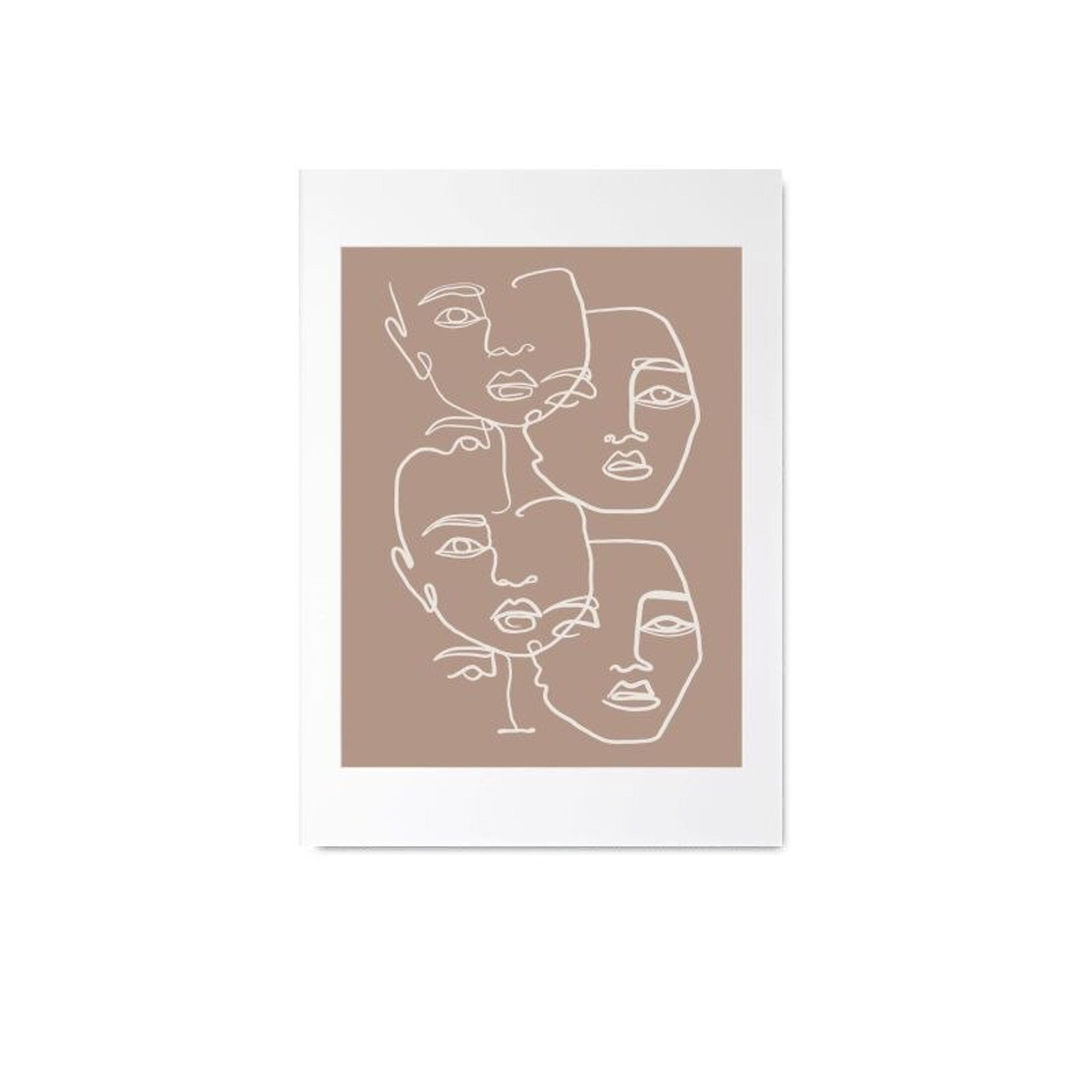Framed artwork with line drawings of faces on a beige background