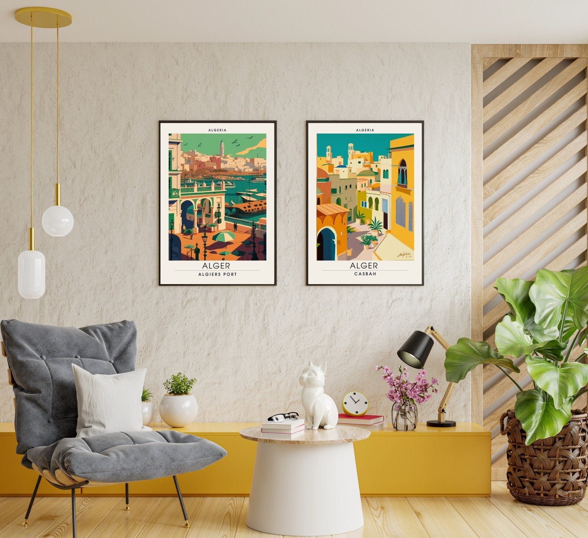 Living room with two framed posters on the wall, a gray chair, and decorative elements.