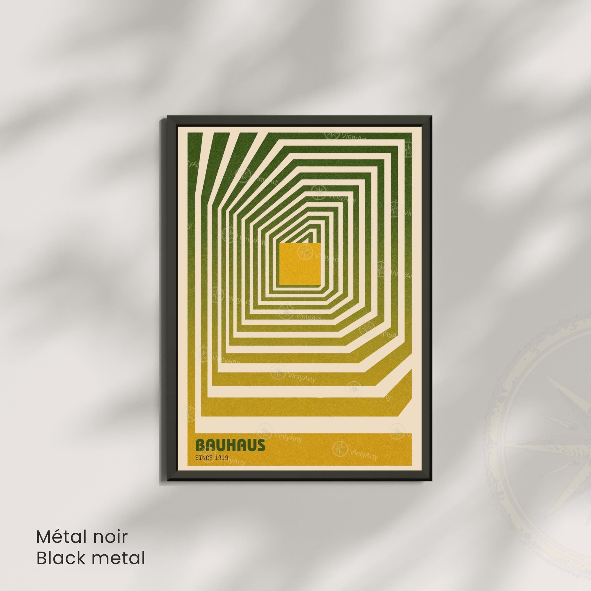 Framed artwork with geometric design and 'Bauhaus' text on a metallic surface