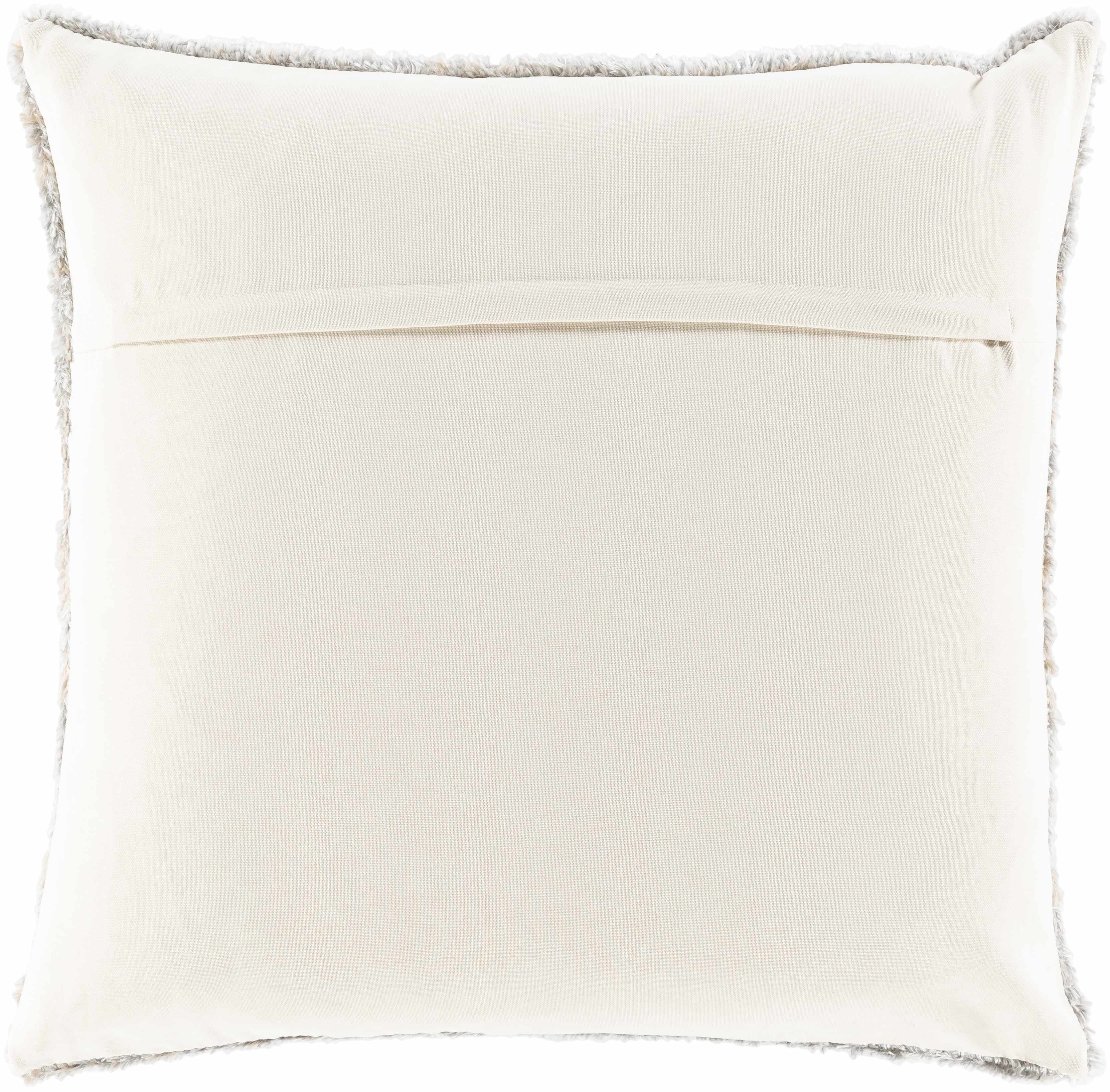 White pillow with a subtle pattern on a white background