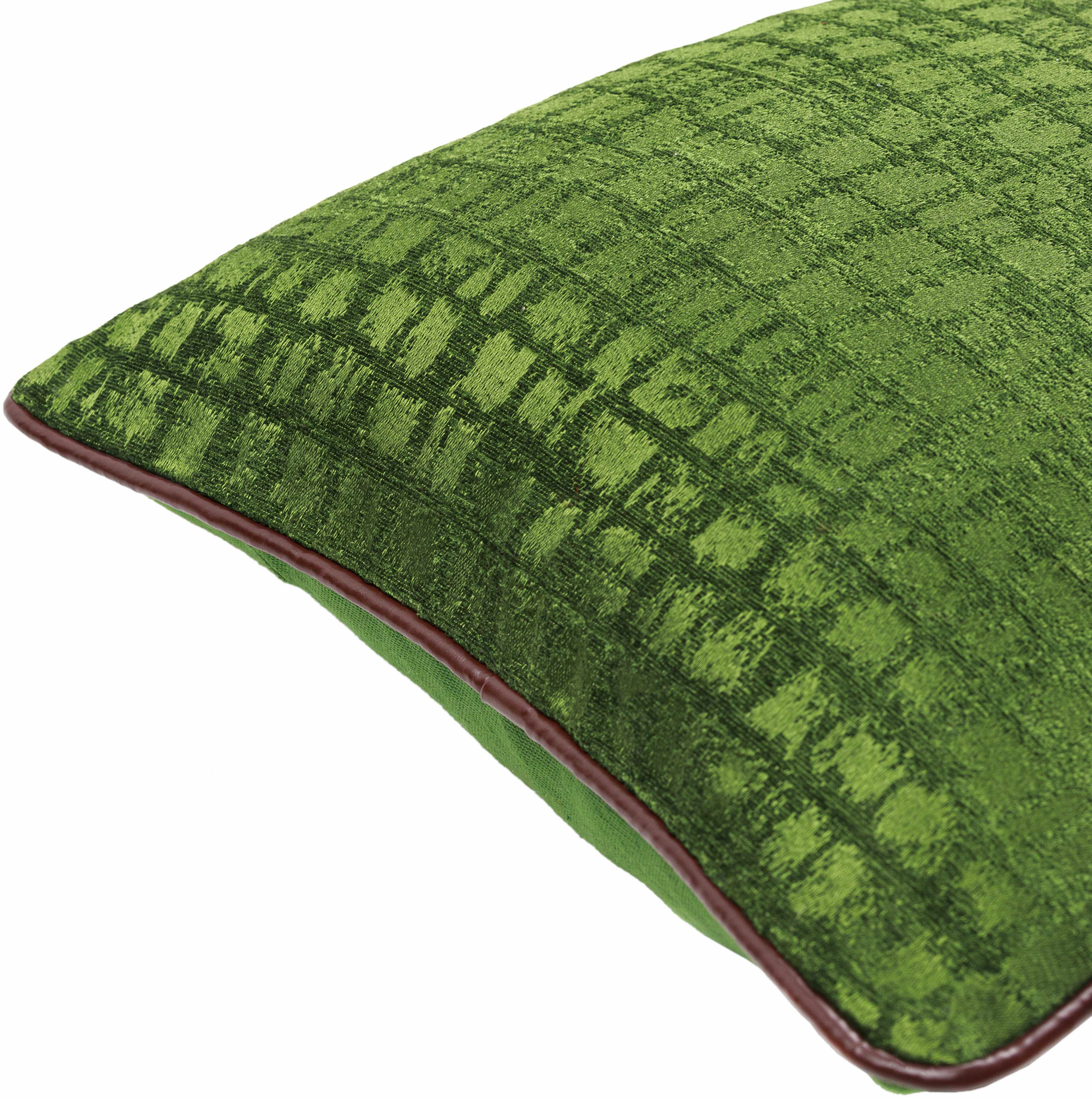 Green textured pillow on a white background