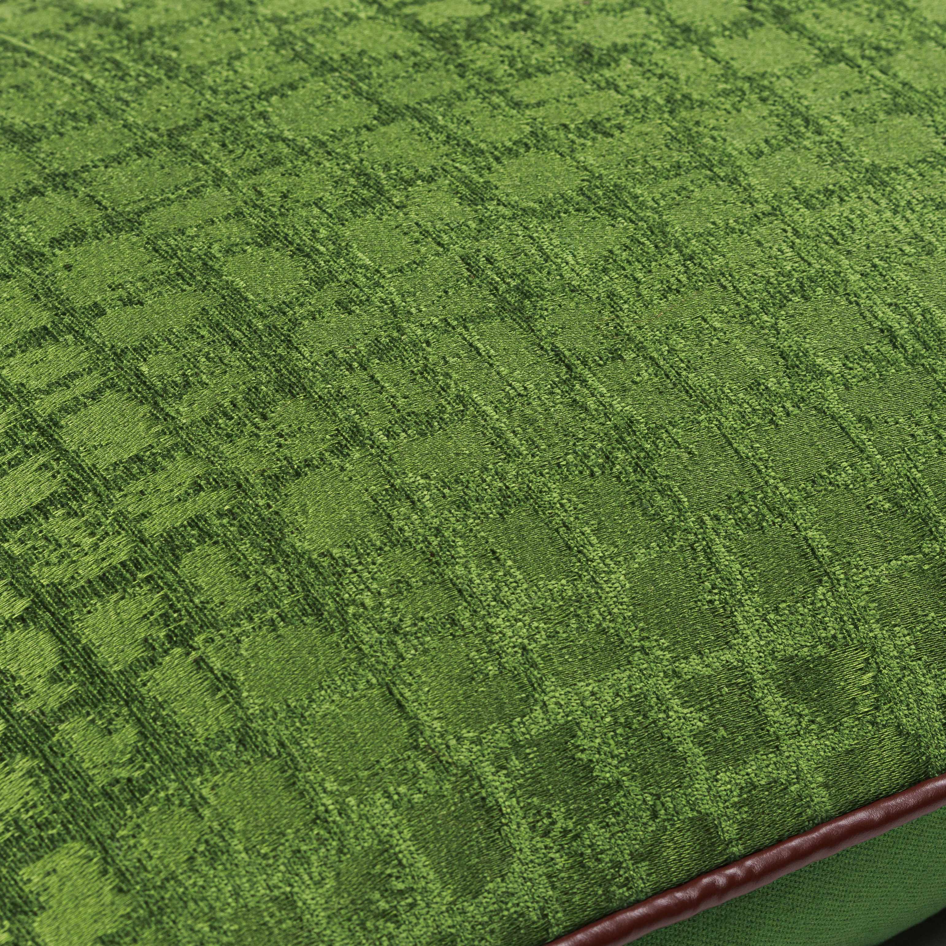 Close-up of green textured fabric with a brown border