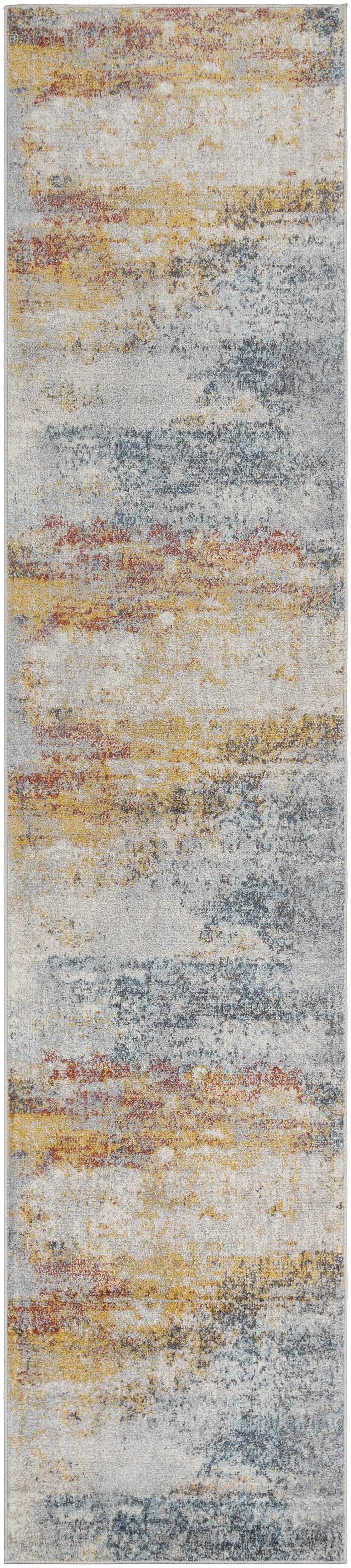 Colorful abstract patterned rug with a gradient of colors.