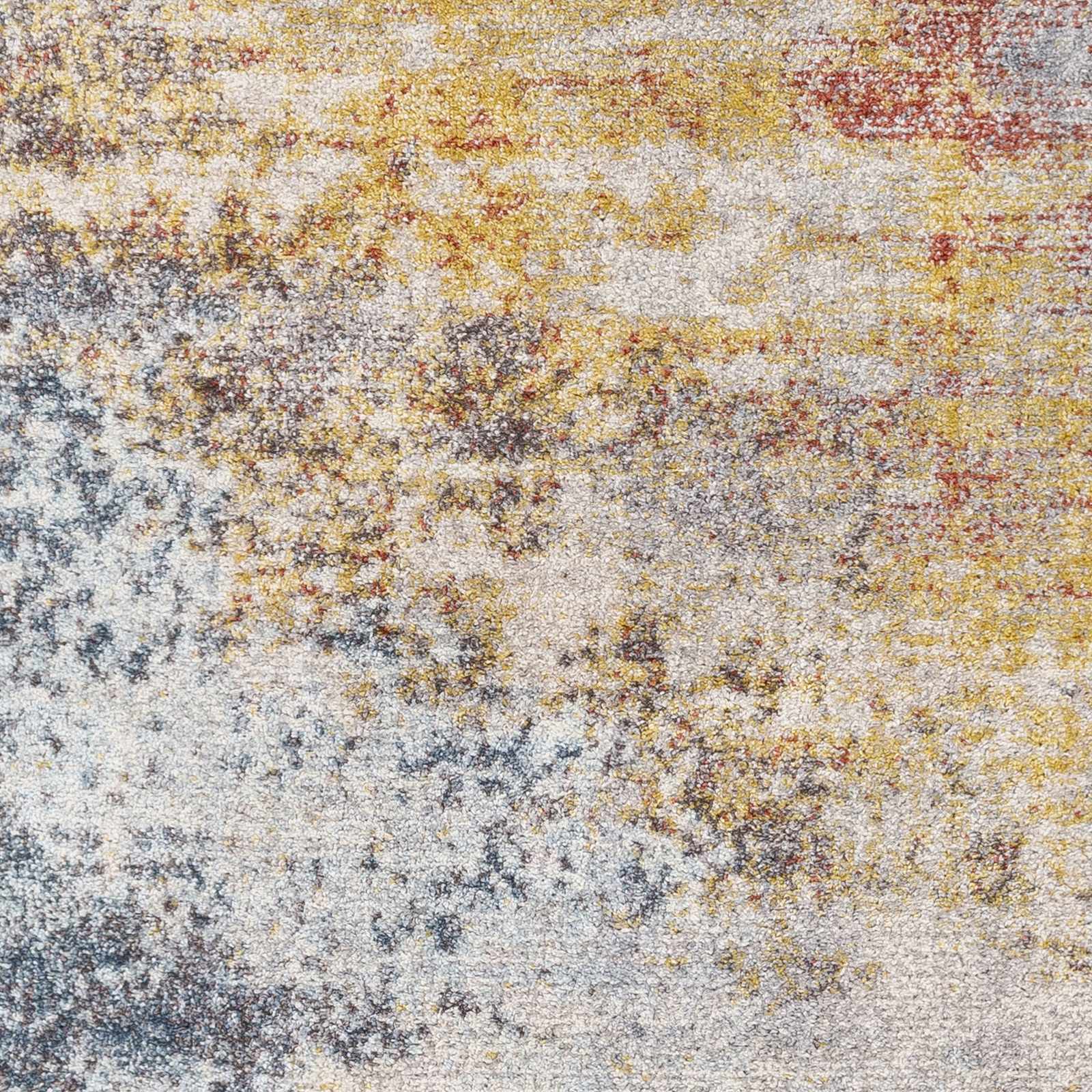 Textured multicolor surface with a pattern of brown, beige, and gray.