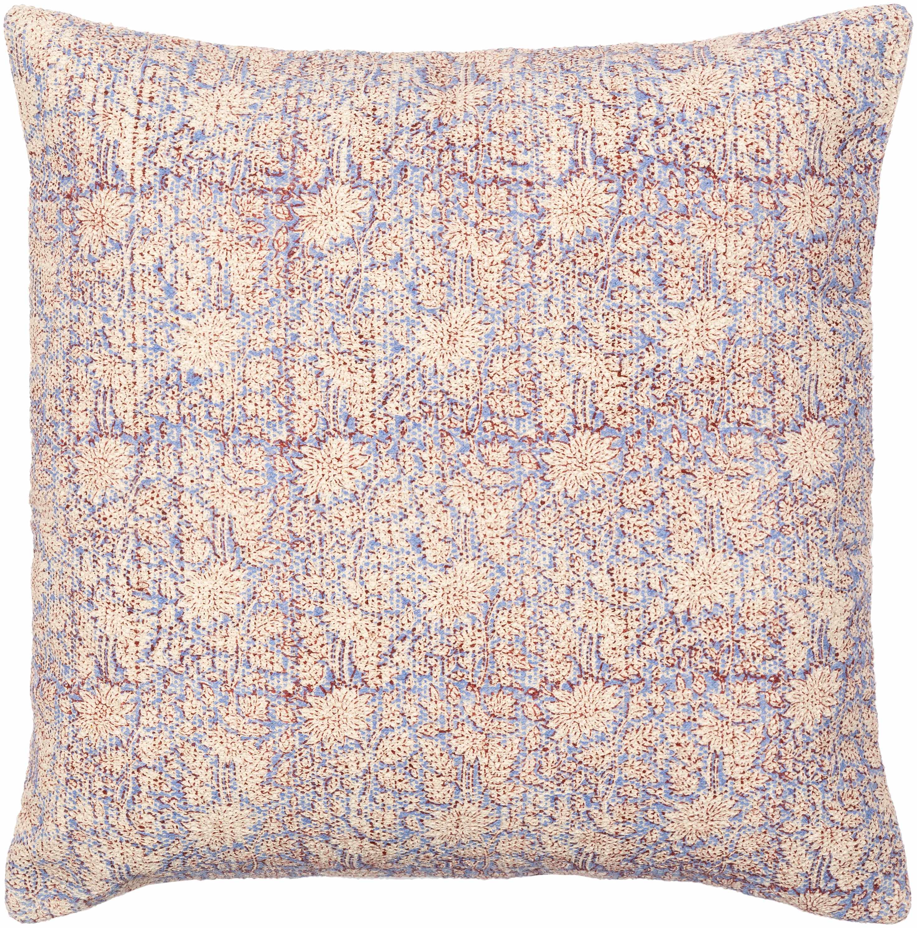 Floral patterned pillow with a soft color palette on a white background