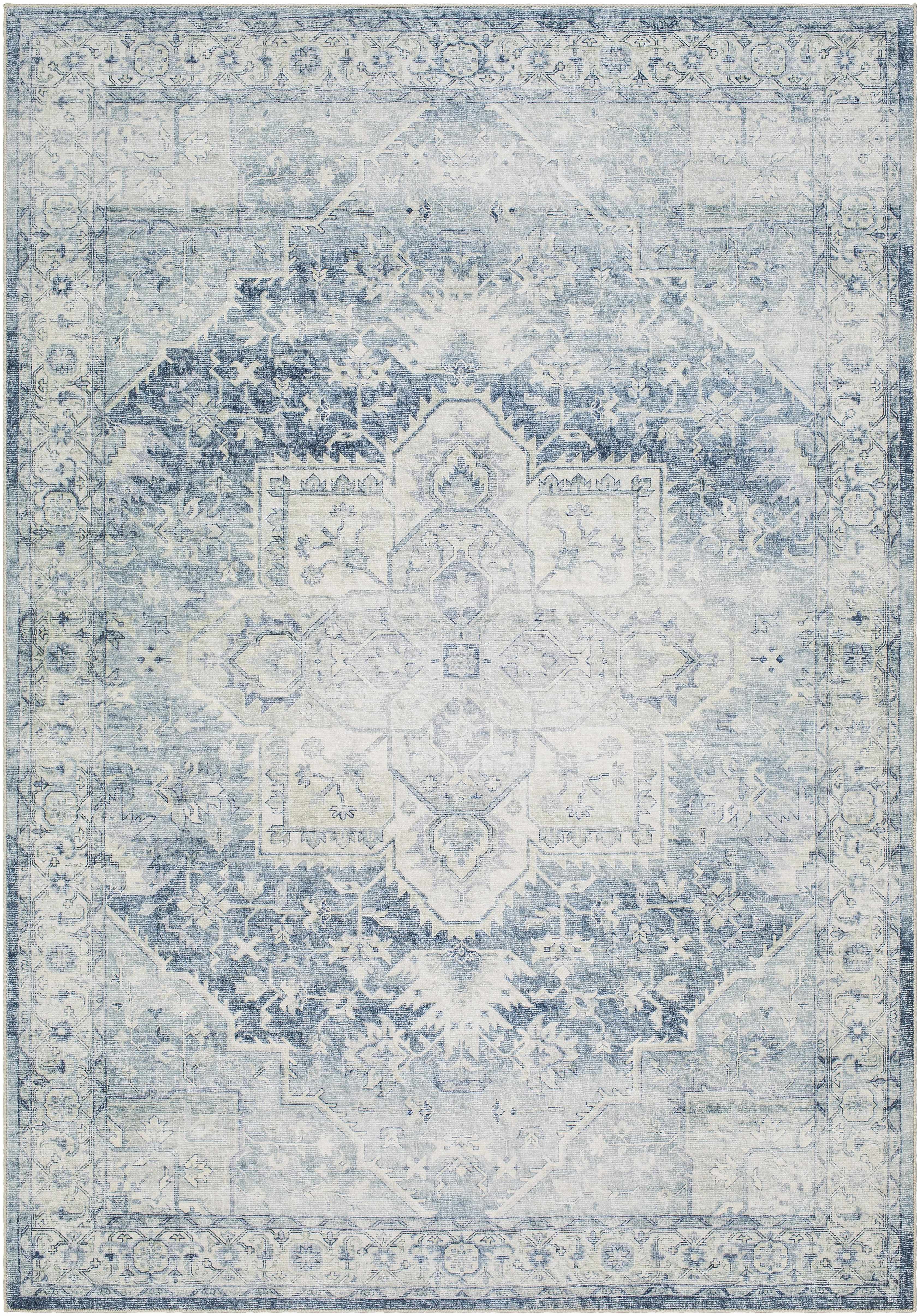Blue and white patterned rug with geometric design