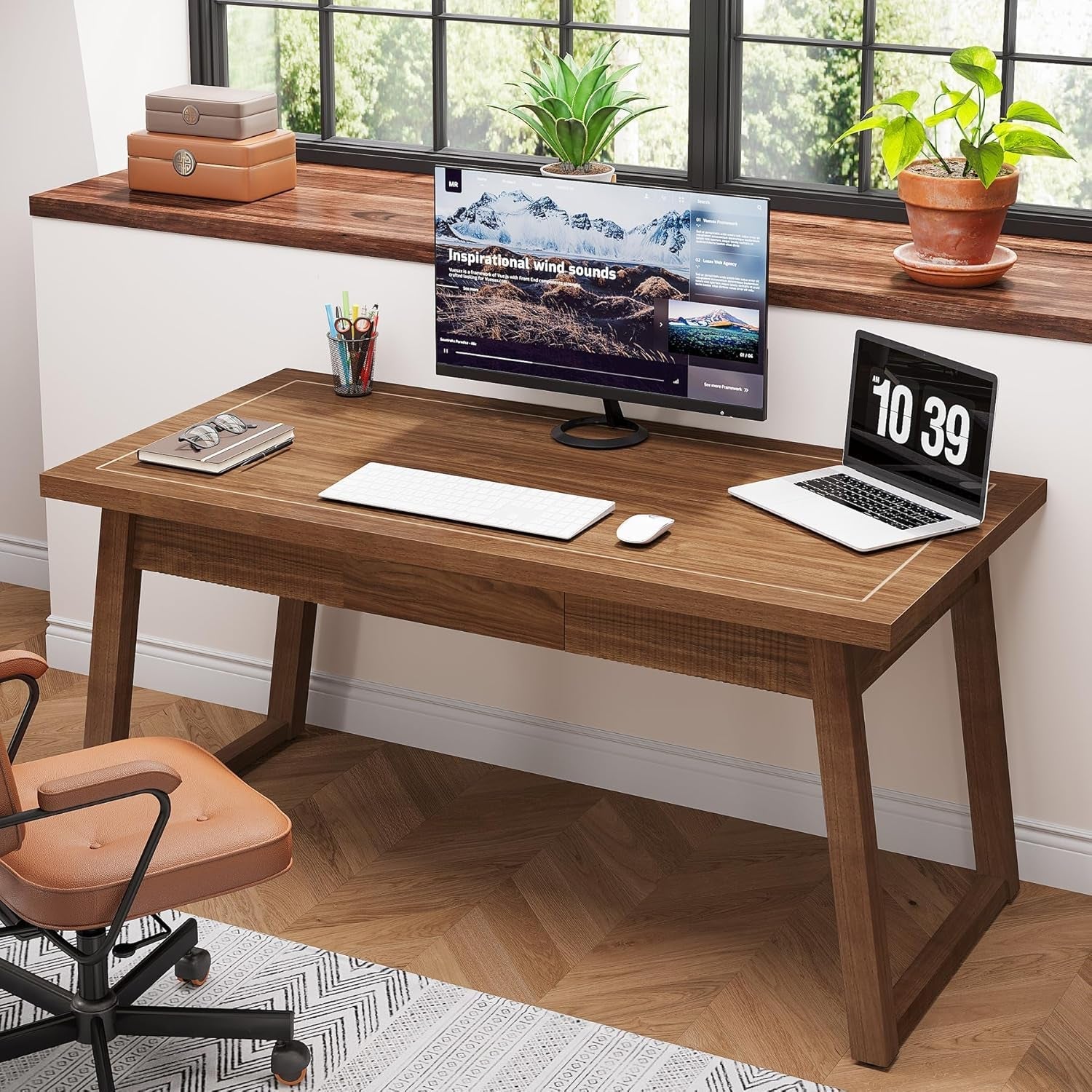 Wooden desk with computer setup in a home office setting