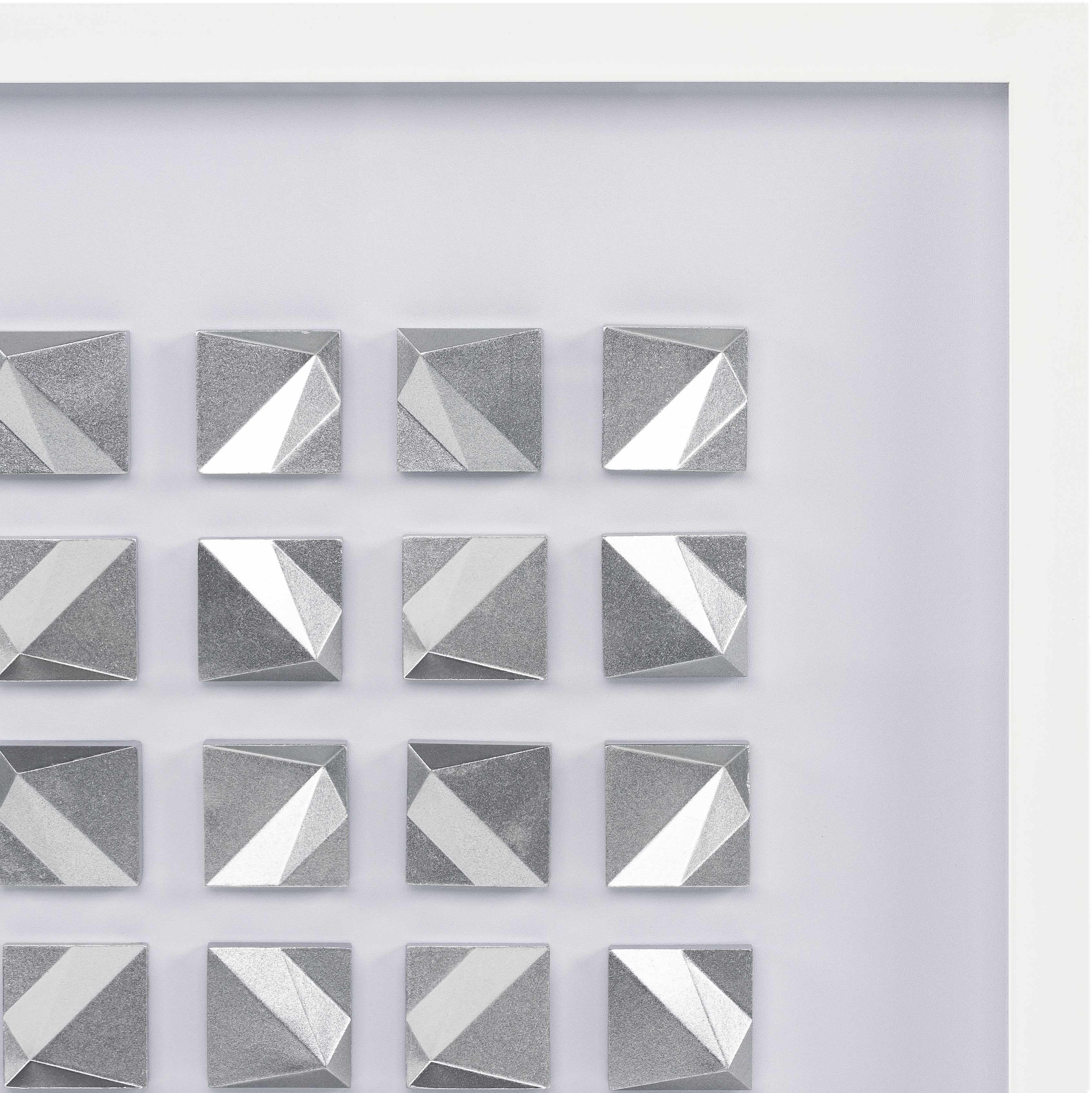 Pattern of silver geometric tiles on a white background