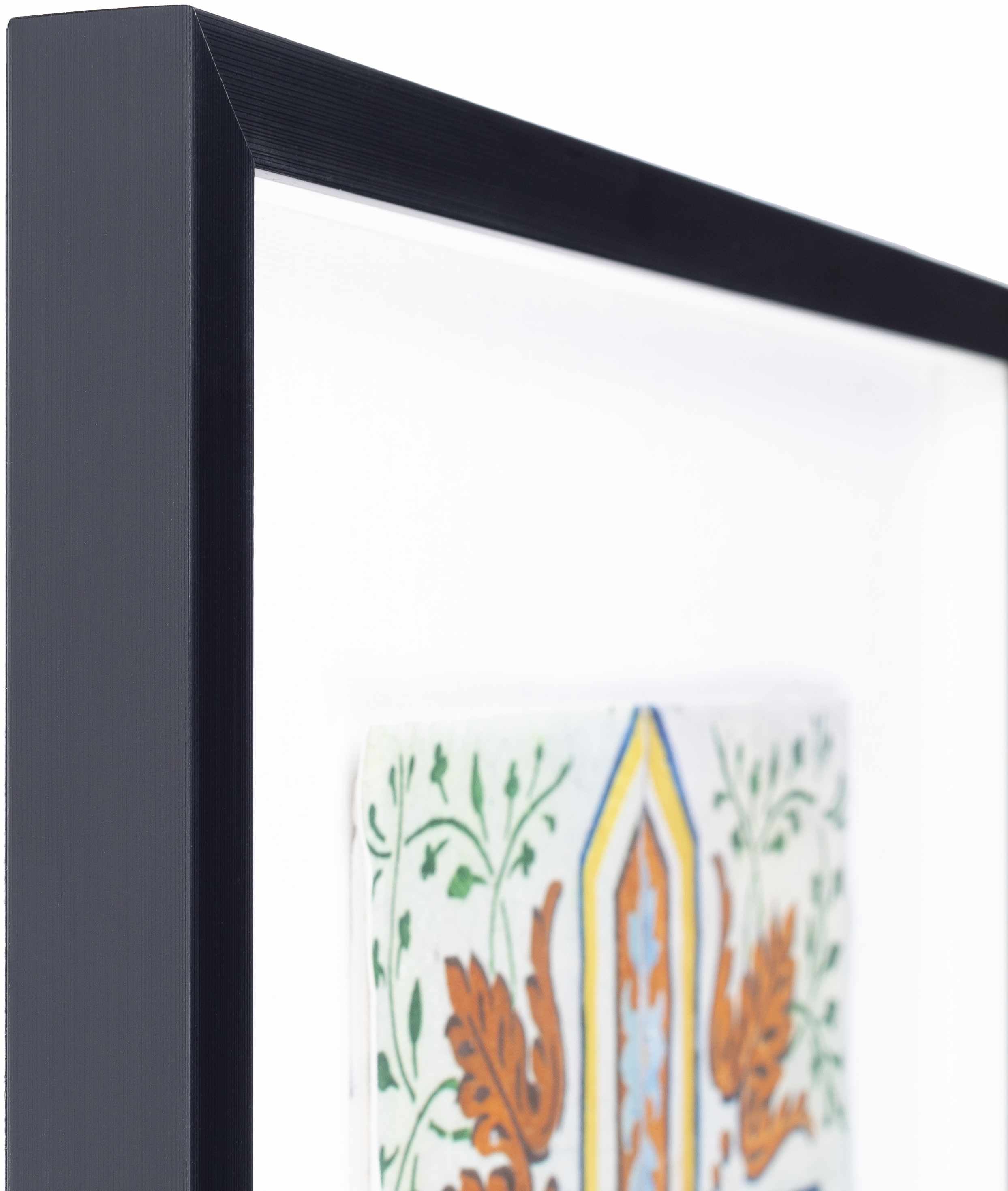 Framed artwork with a decorative design on a white background