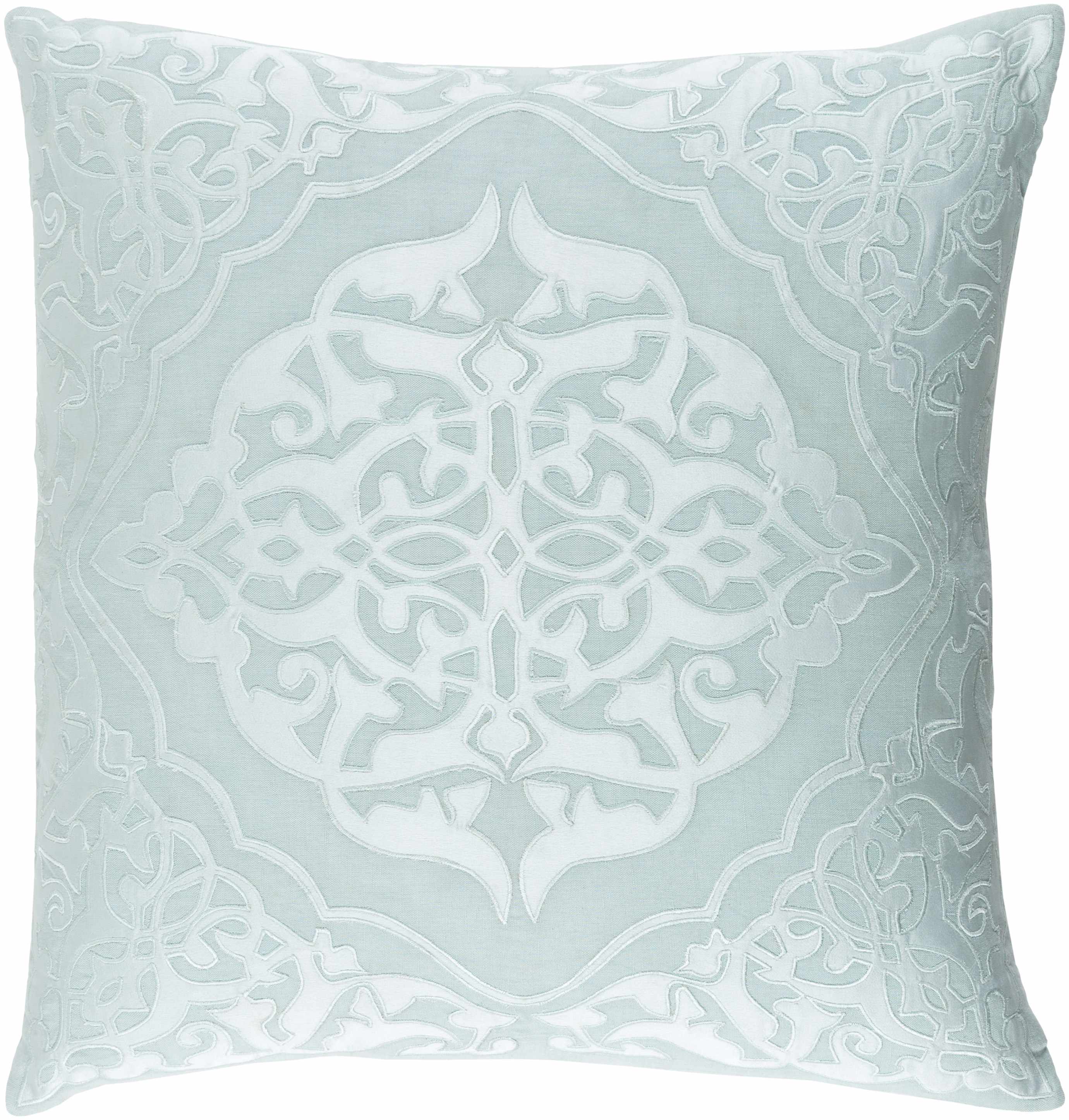 Decorative pillow with intricate pattern on a light blue background
