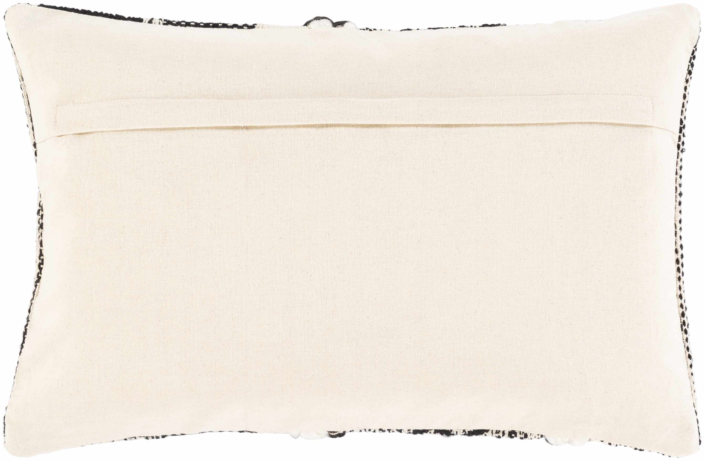 Beige pillow with black trim on a white background