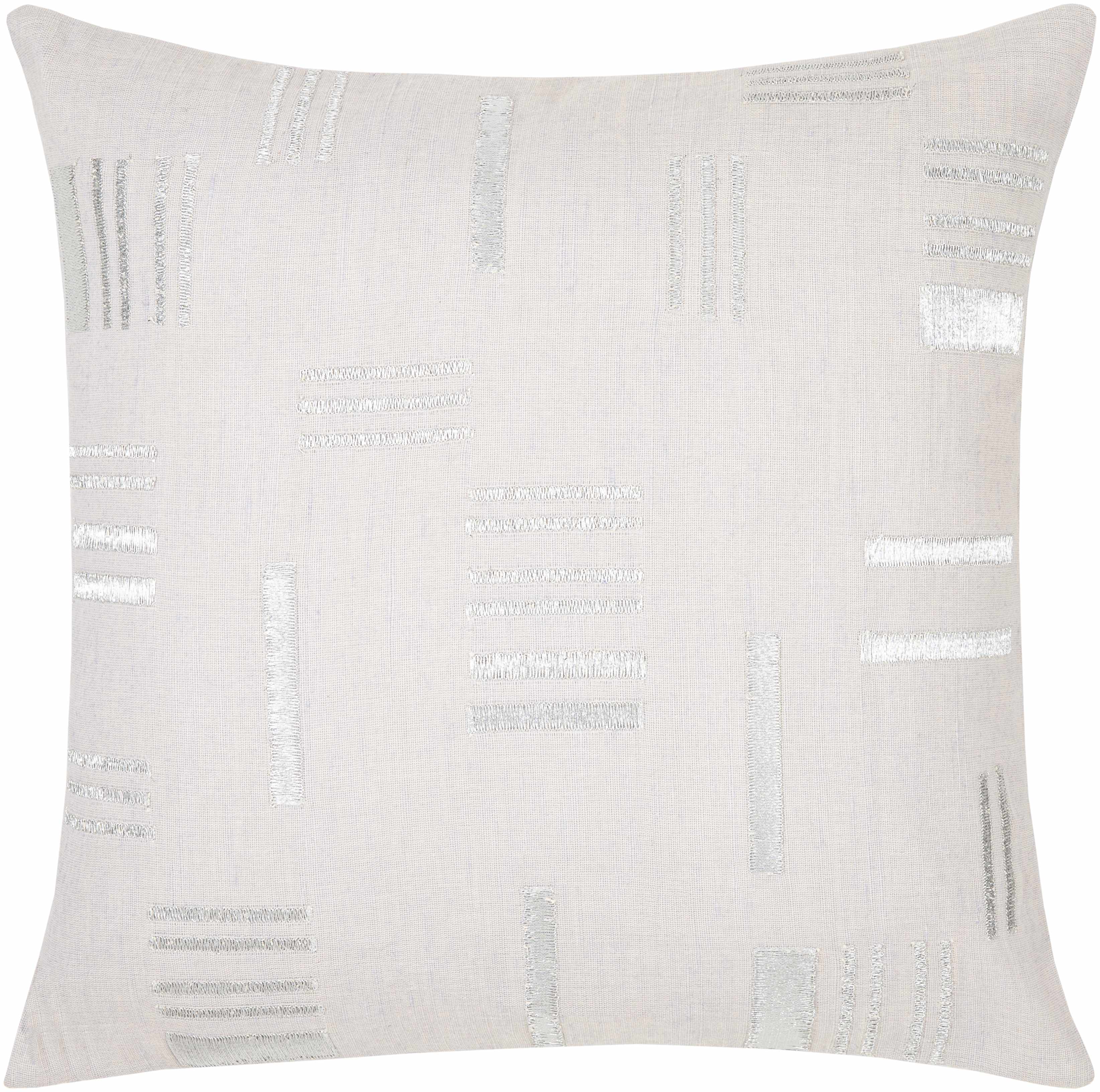 White pillow with subtle pattern on a white background