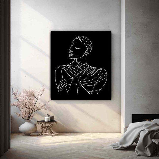 Modern interior with a minimalist line art portrait of a woman on a wall.