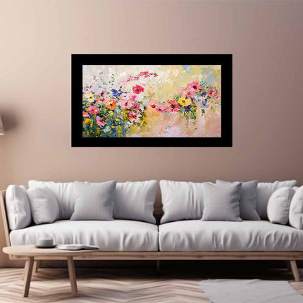 Framed floral painting on a wall above a sofa in a living room.