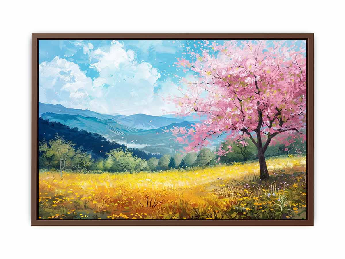 Framed painting of a cherry blossom tree in a field with mountains in the background