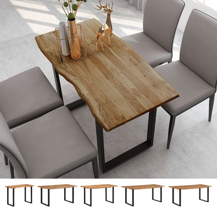 Dining table with wooden surface and metal legs, surrounded by gray chairs in a modern interior setting.